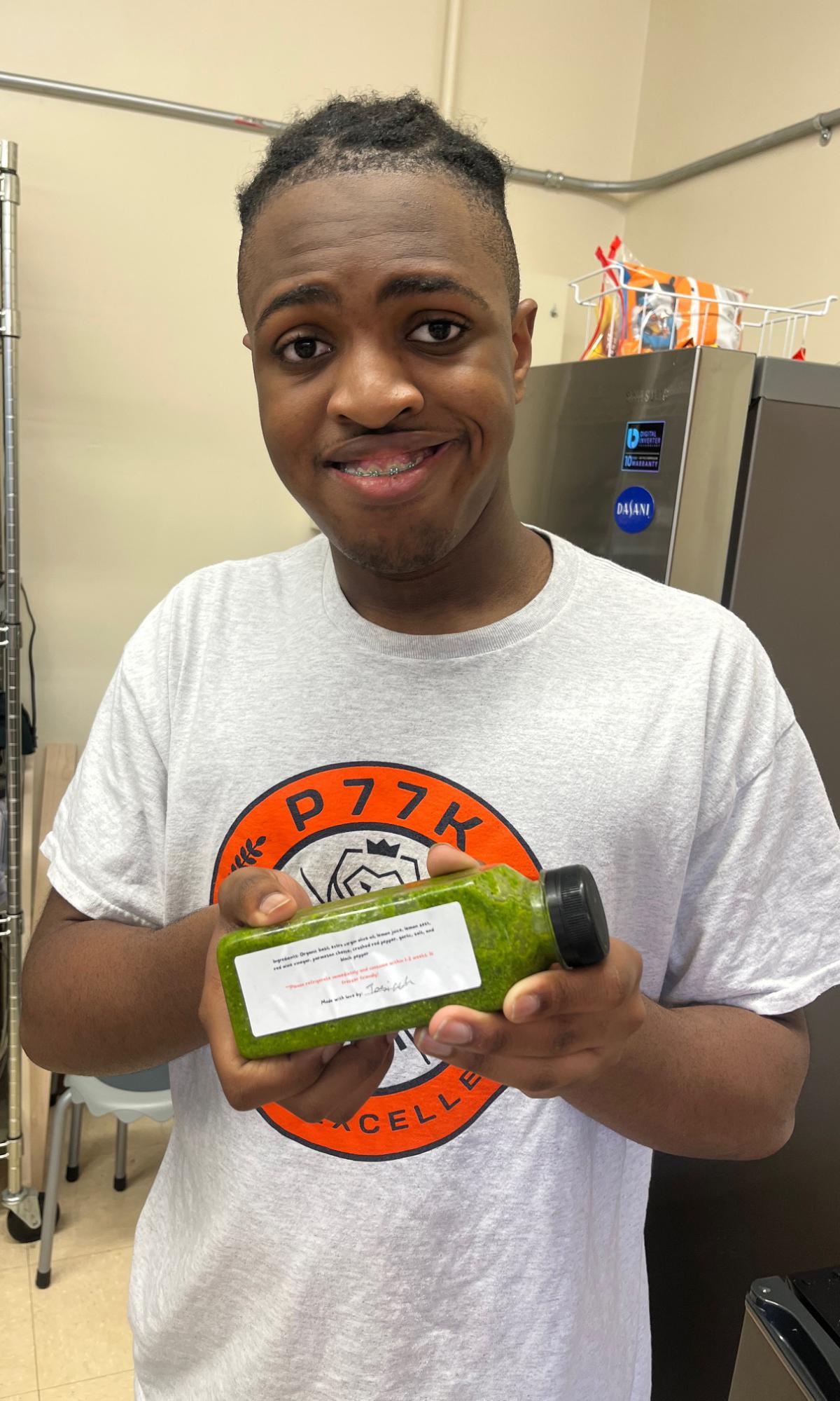 person holding up a juice