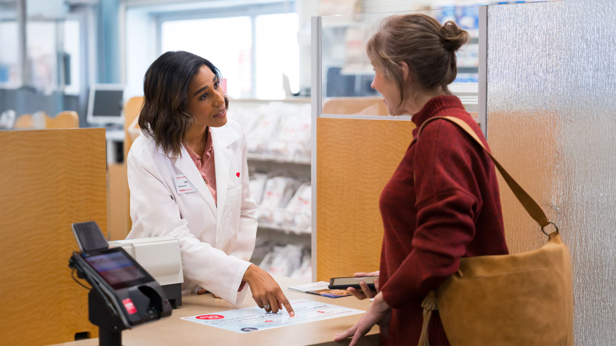 Pharmacist working with a customer