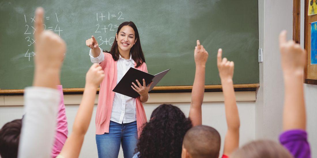 teacher in front of classroom