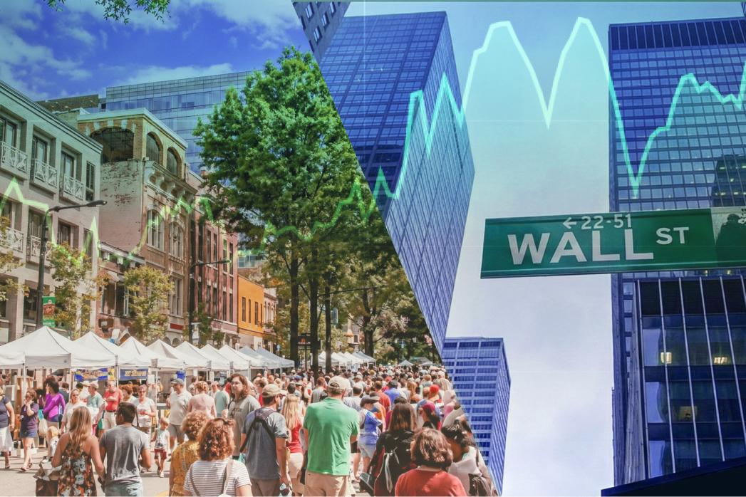 Wall Street sign and people in the street