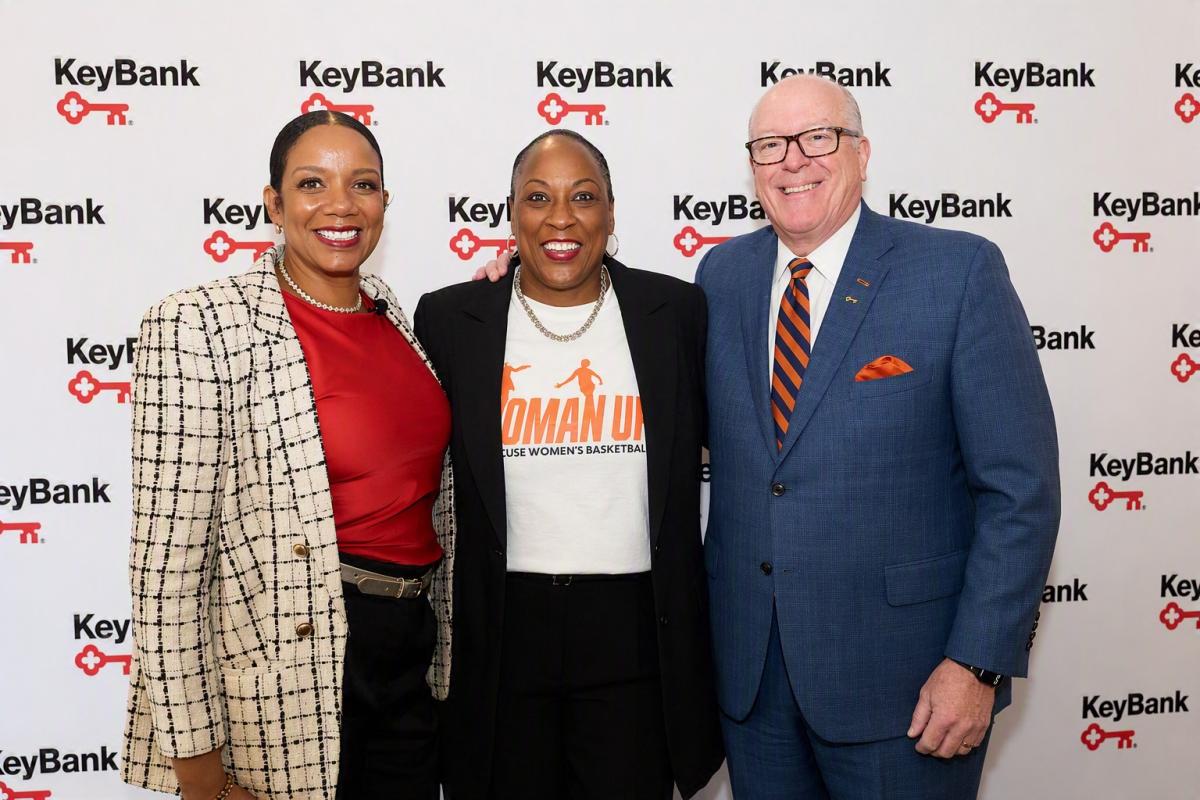 people smiling together at event