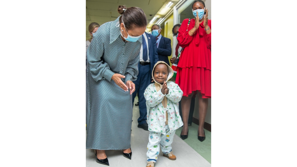 A young child shown in a healthcare facility in Africa.