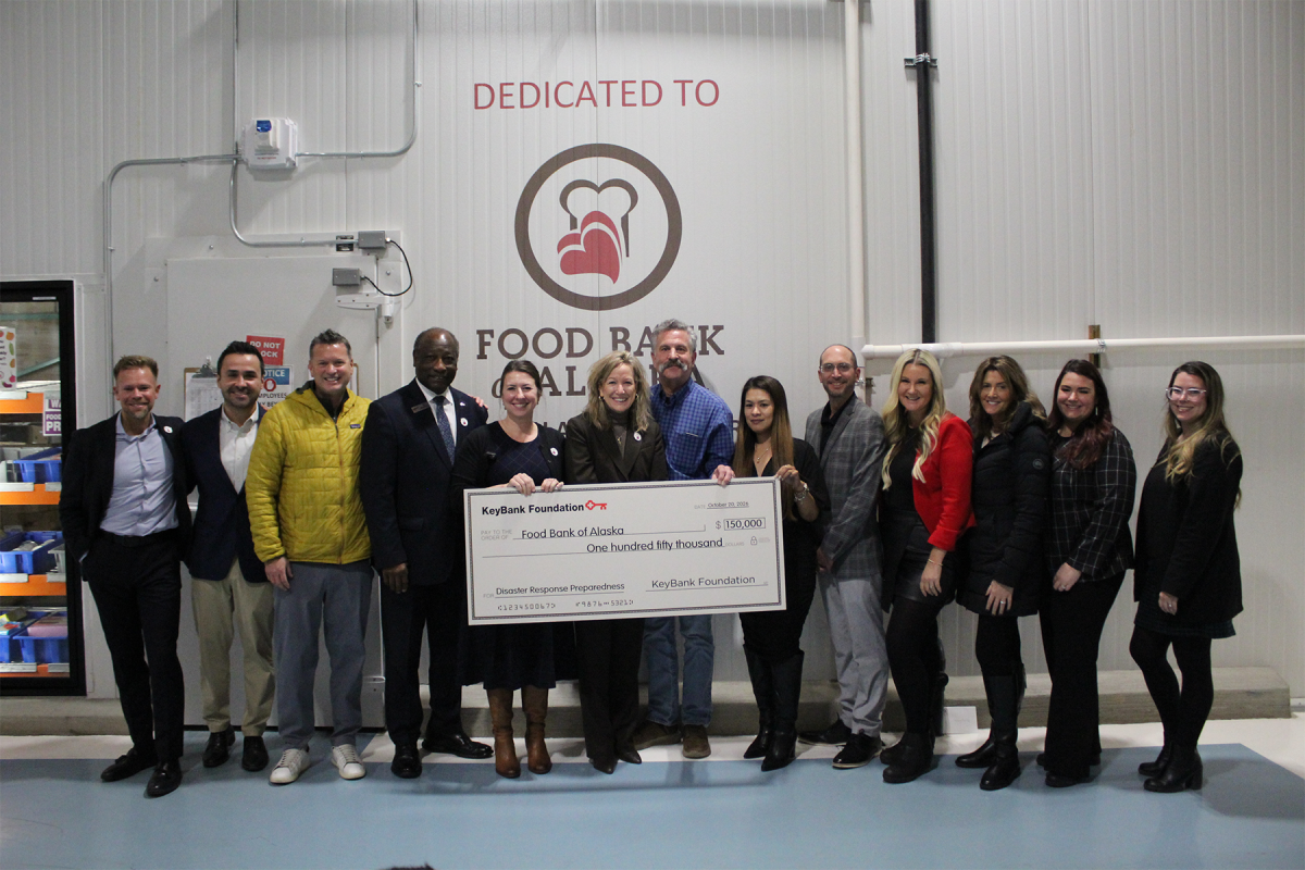 KeyBank and Alaska Food Bank Team members shown with a $150,000 grant check.