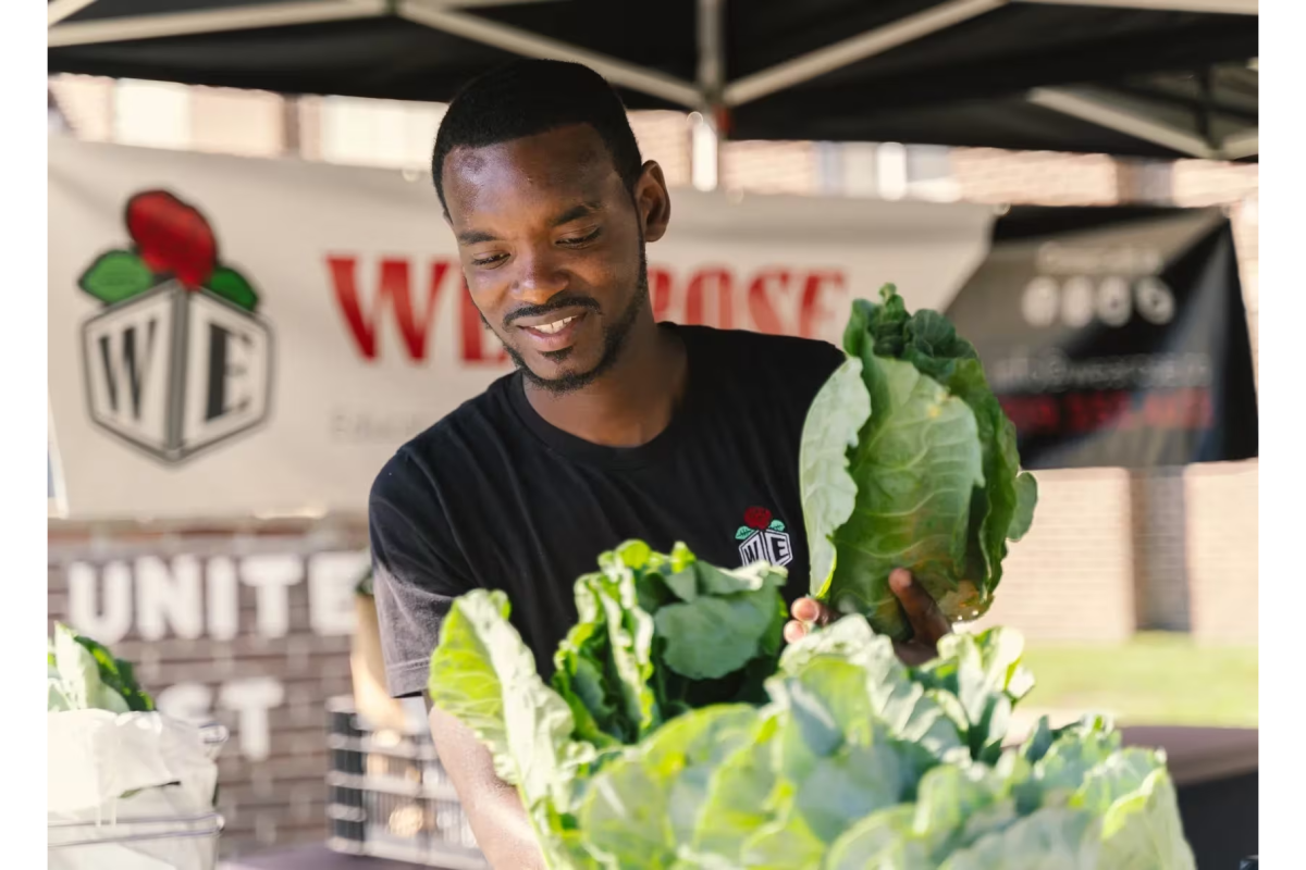 DaQuan Campbell holding cabbages