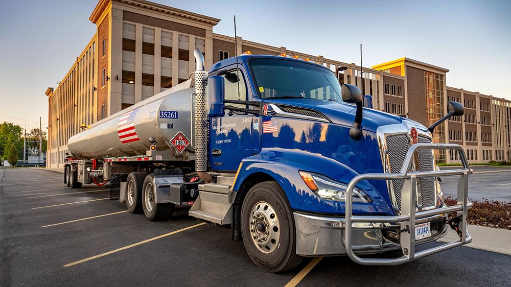 18 wheeler parked in front of a building
