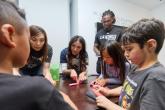 Children from Little Tokyo Service Center learn about hockey with the LA Kings Ice Crew.