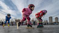 young children practice speed skating