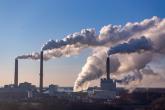 Emissions rising from facility smoke stacks