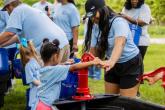 Pumping water at Walk for Water