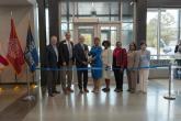 Group photo of the ribbon cutting