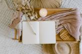 A blank journal shown with a pencil.