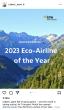 screengrab of a twitter post from robert_isom. Image is of forested mountains and American Airlines logo with 2023 Eco-Airline of the year.