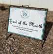 lawn sign reading Yard of the Month