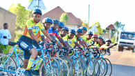 Group of people lined up on bicycles