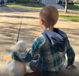 Young boy shown with My Special Aflac Duck.