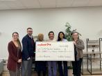 The Center for Homeless in South Bend team shown with a $150,000 grant check.