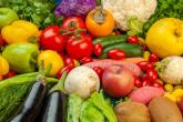 Tabletop with fruits and vegetables.