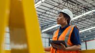 Female engineer looks out at a project