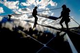 People installing solar panels