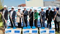 Elanco team with shovels 