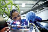 MilliporeSigma employee inspecting wires