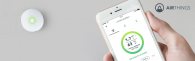 Airthings Radon detection unit and app on smartphone.