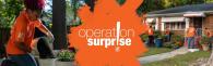 Operation Surprise! Home Depot volunteers are repairing a house. A woman is pouring cement from a bucket.