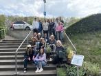 Equipped with shovels, gloves, and watering cans, the group spent the day planting a total of 412 new plants and sowing flower seeds.