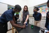 A KIPP St. Louis science teacher with students