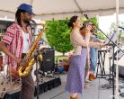 HARMAN employees onstage performing.