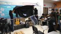 Unveiling the musical instruments at John C. Fremont High School.