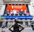 No Kid Hungry banner on the front of the New York Stock Exchange