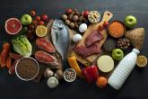 Array of different meat, fish, fruits and vegetables.