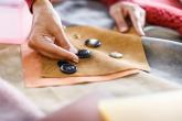 Coach designer matching buttons to fabric