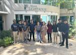  Student group in front of school entrance