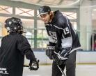 LA Kings Alex Iafallo talking to child during LA Kings “We Are All Kings” Rink Tour  