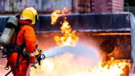 person putting out fire