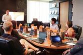 Employees in a conference room.