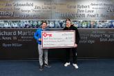 KeyBank and Rasmus Dahlin Foundation members shown with a grant check for $31,031.