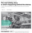 A shopper examines holiday ornaments on a store shelf, illustrating how record retail demand places pressure on supply chains during peak season.