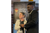 DP World employee presents award to Working Gear Intern