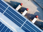 solar panels and truck trailer at rooftop facility