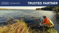 Person doing field test in a pond