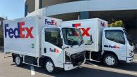 Two FedEx trucks
