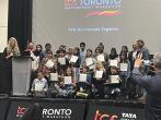 K-12 students pose for photo