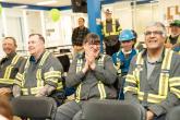 Employees at a meeting at Saint-Gobain Canada.