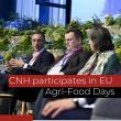 Three people seated on a stage "CNH participates in EU Agri-Food Days"