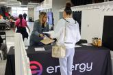Entergy employee helping a customer at a desk