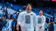 UNC basketball players wearing the student-created t-shirt design 