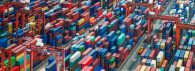 Large shipping facility with hundreds of stacked shipping containers